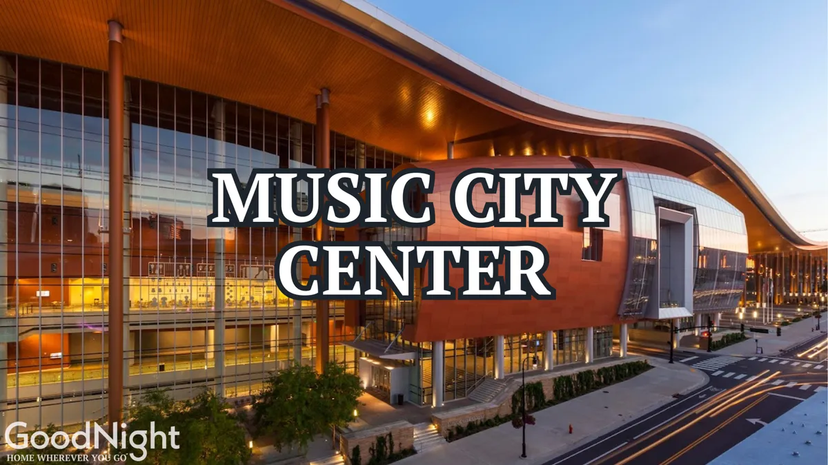 The striking exterior of Music City Center, with its modern curved roofline, glass facade, and surrounding greenery, sets the stage for major concerts, exhibitions, and community events in downtown Nashville. The energy of the venue and its capacity for large gatherings are clearly evident.